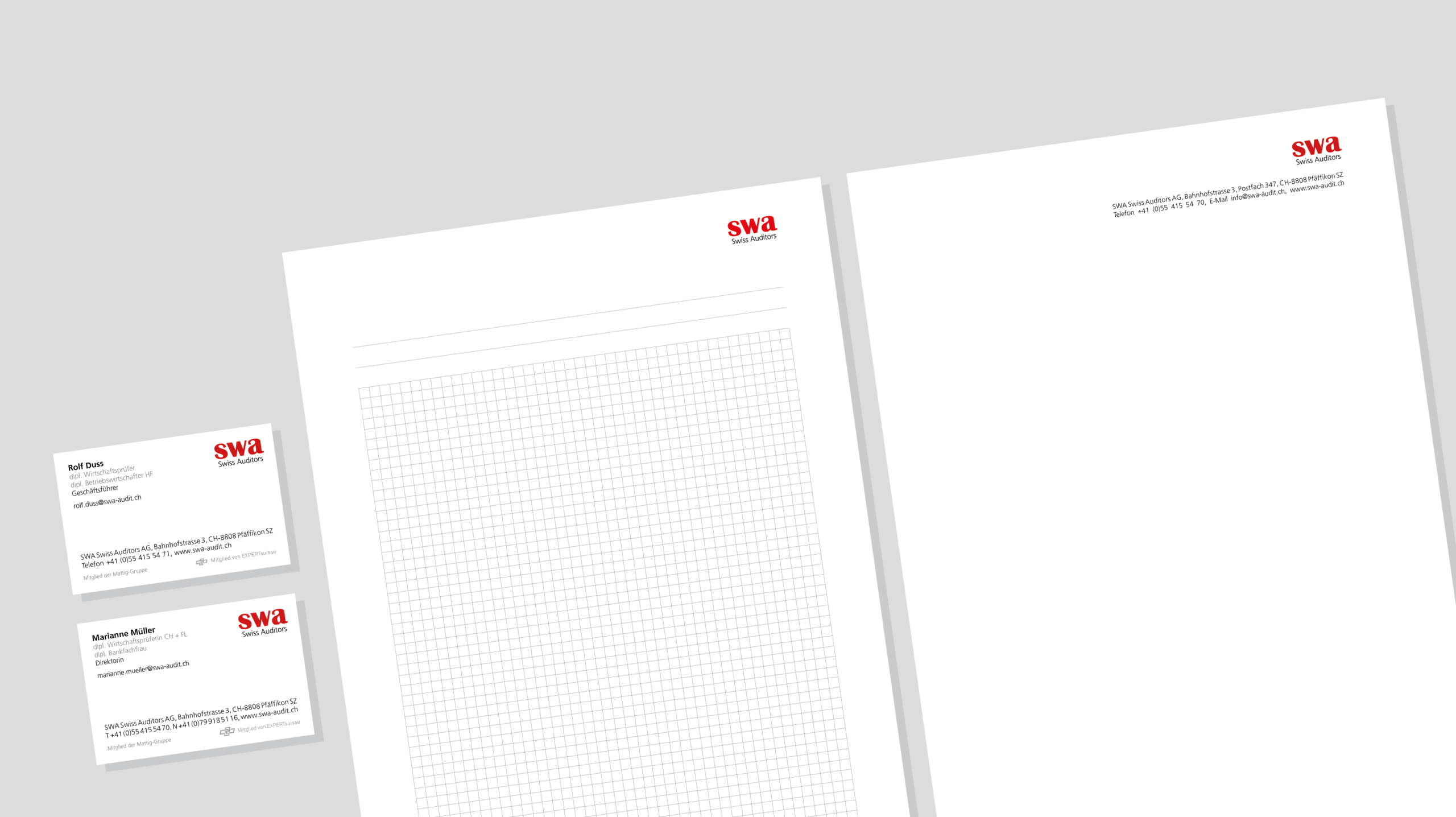 Geschäftspapiere von SWA Swiss Auditors: Visitenkarten und Briefpapier im Corporate Design.